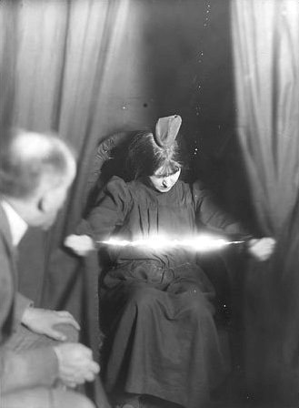 medium Eva Carrière in seance mediums